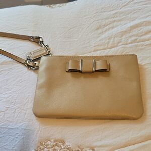 Coach Tan Wristlet Clutch with Bow Accent